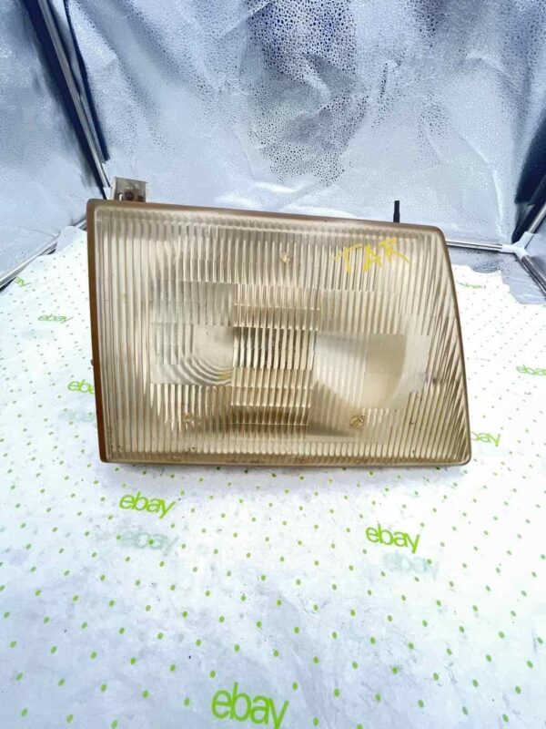 95 (DISCONTINUED) FORD VAN (FULL SIZE) Headlamp Assembly Right passenger side